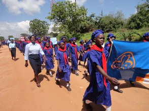 06_2010_Kenya_Stop the Violence_March_carrying flag_WAGGGS Flag